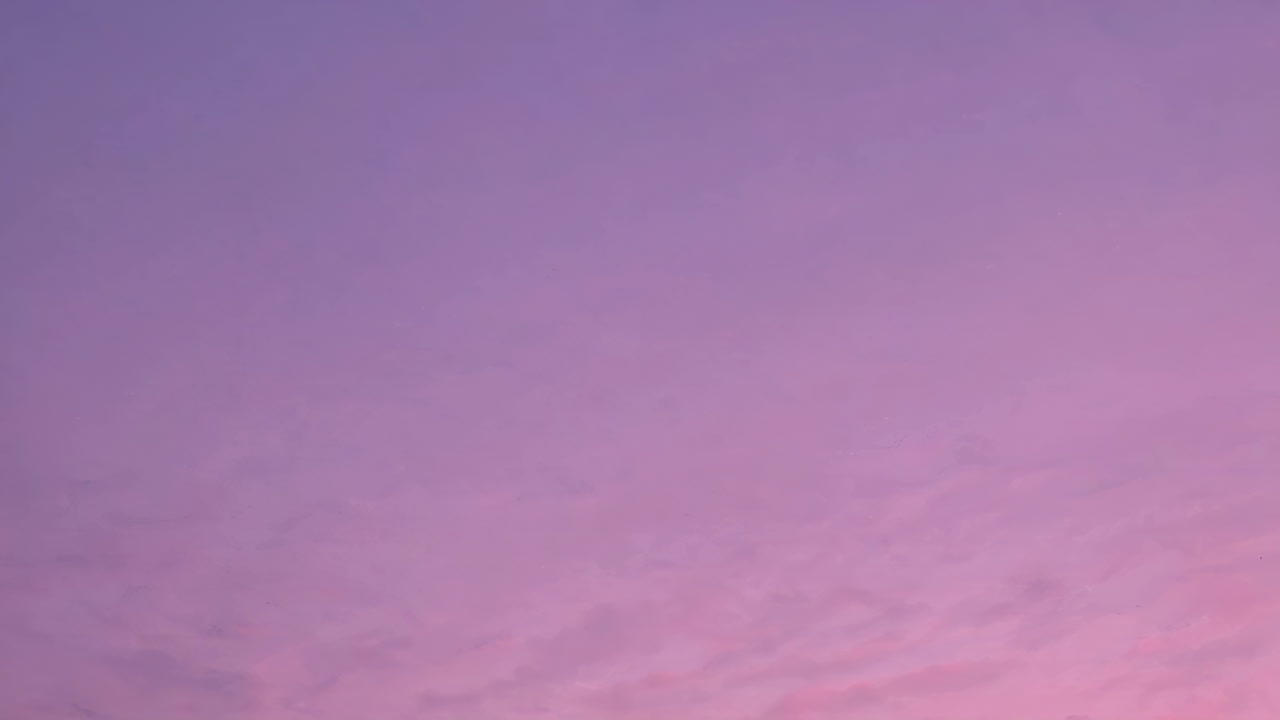 Purple and Pink Sunset Sky with Clouds