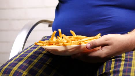 person eating french fries