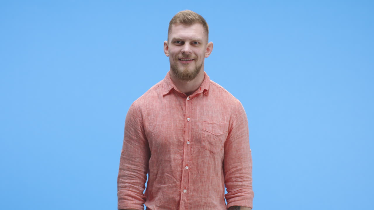 Man Holding a Sign with the Word "LOVE"