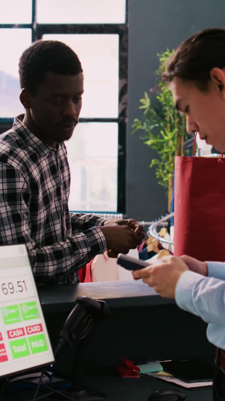 Customers paying at a retail store