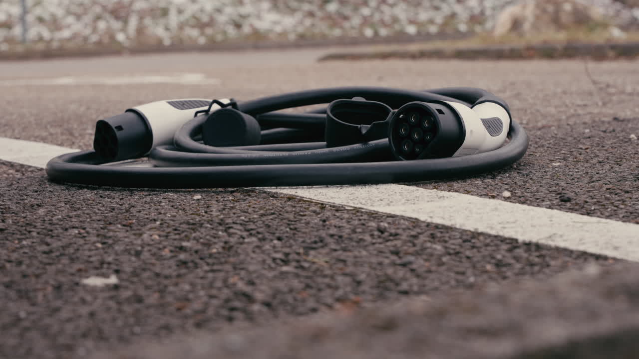 Electric Vehicle Charging Cable on the Road