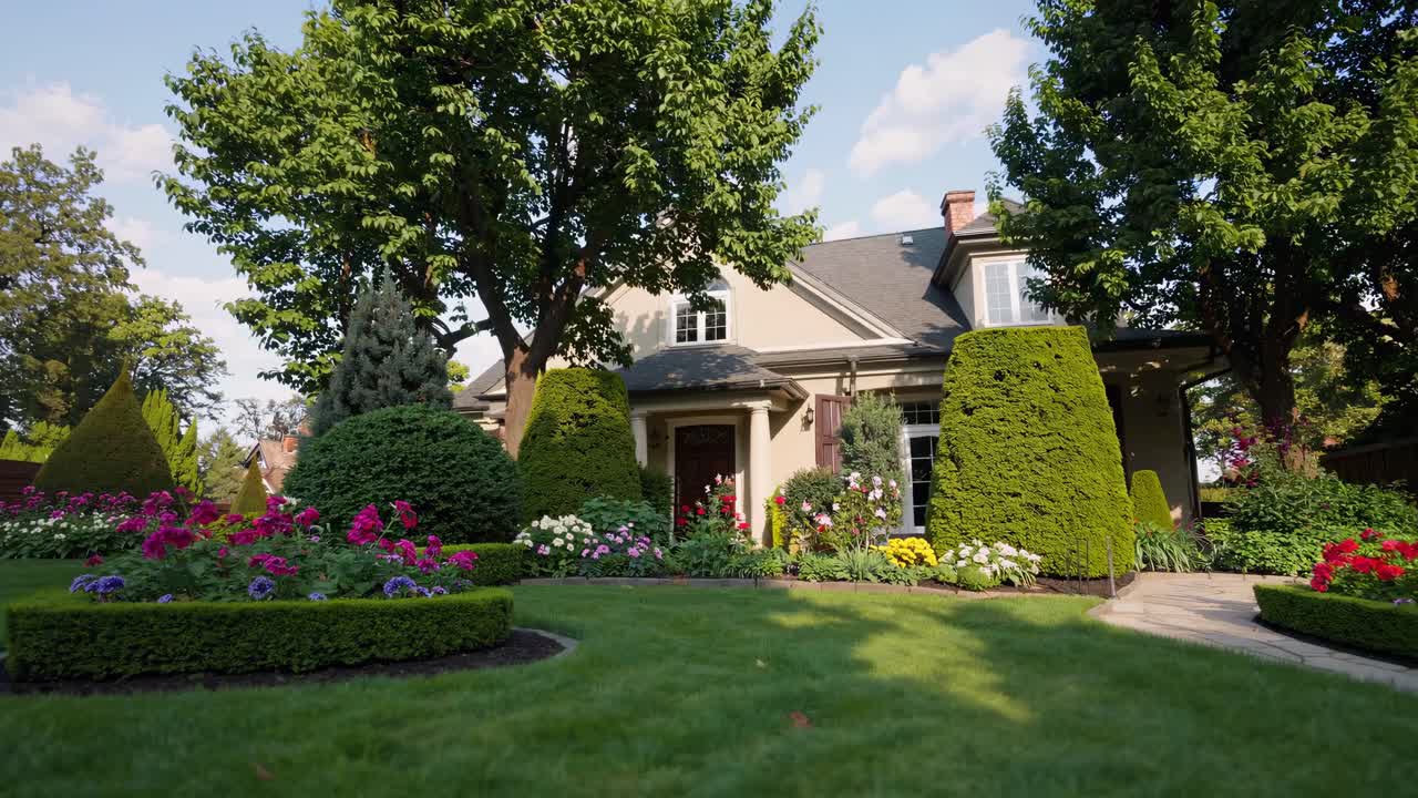 A picturesque suburban home with manicured garden, captured from a low-angle, showcasing vibrant