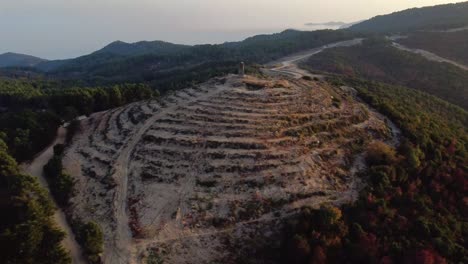 Aerial-over-fire-zone-in-the-forest-with-watch-tower