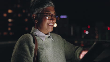 woman, night business and tablet on city rooftop