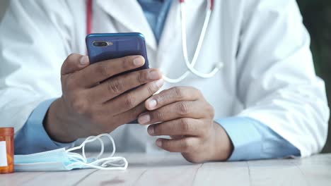 doctor using smartphone for consultation