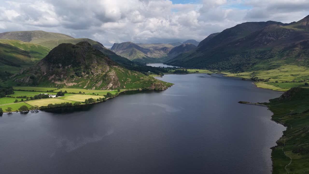 Aerial view over Crummock water with Buttermere lake and sourounding Fells, The Lake District, Cumbria, England