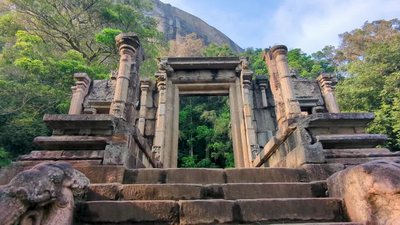 Ancient stone stairway case and doorway of historical palace at Yapahuwa Rock Fortress in Sri Lanka
