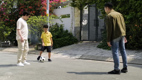 asian men and boy having fun outdoor