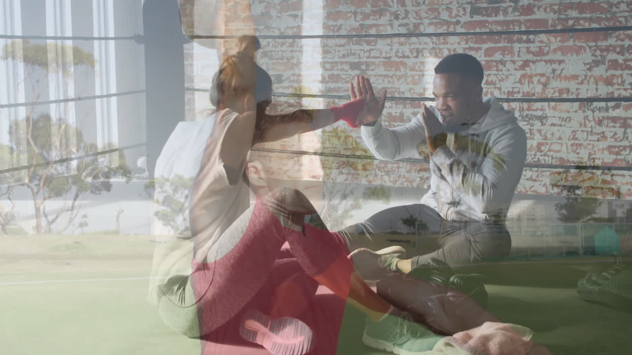 Practicing boxing techniques, two people training in scenic outdoor landscape