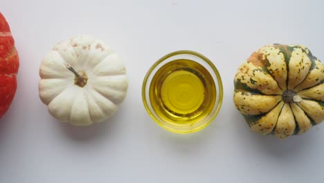 assortment of small pumpkins and cooking oil