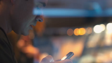 man chatting in social media on smart phone