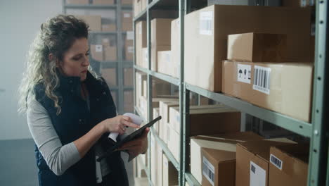 warehouse worker scanning packages