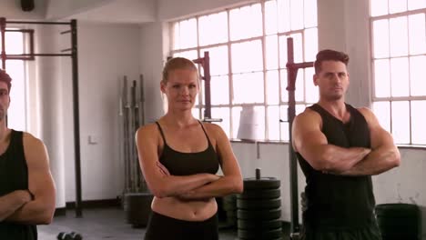 Fit-people-posing-in-crossfit-gym