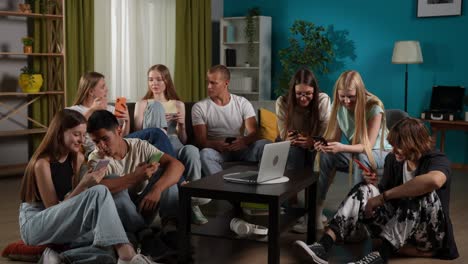 teenagers gathering at home, using smartphones and tablets