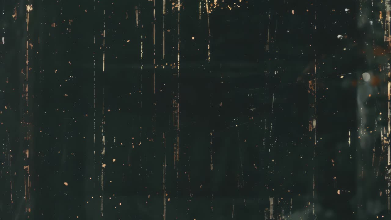 Vintage film effect with vertical scratches on a dark background, captured from a straight-on angle