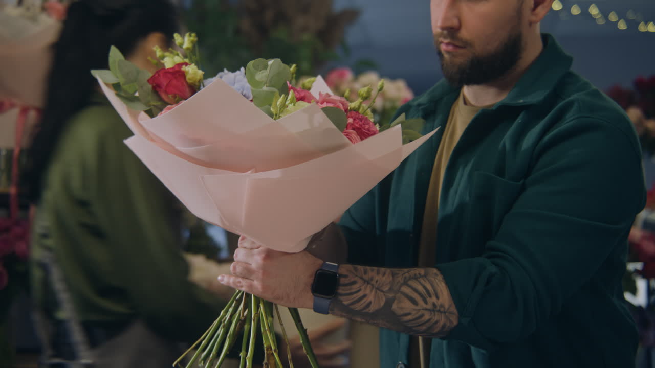 A florist making a flower bouquet