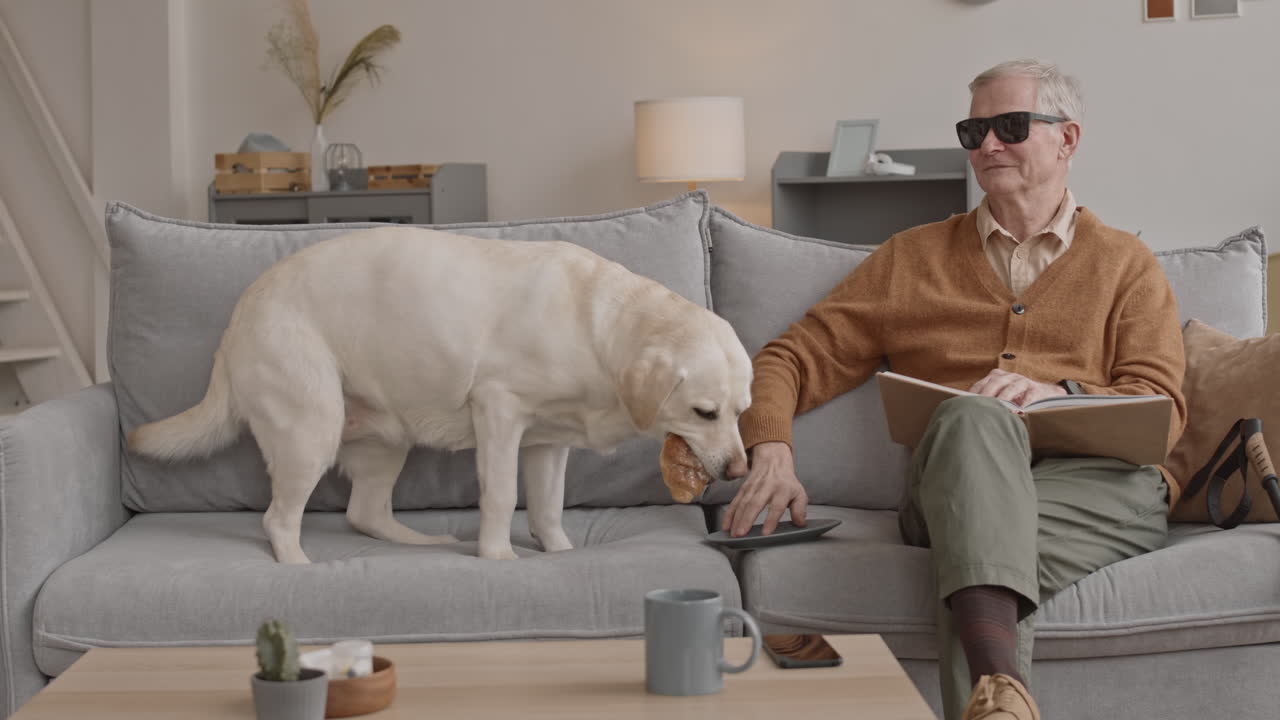 Old Man with Dog at Home