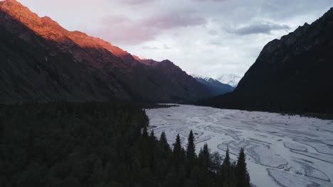 river and mountains at sunset.