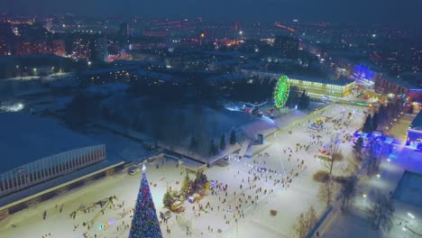 winter-fair-with-Christmas-tree-and-Ferris-wheel-aerial-view