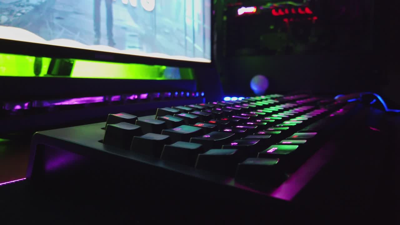 Modern Gaming PC On Desk with RGB Lights Glowing in Gamer's Dark Room