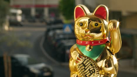 a chinese lucky cat saying hello