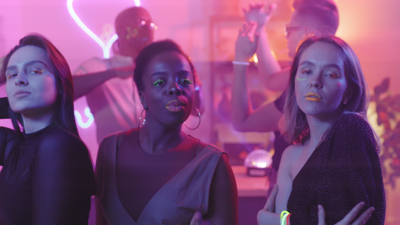 Three Women Dancing at House Party