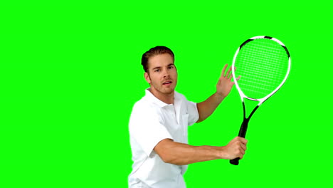 Man-playing-tennis-