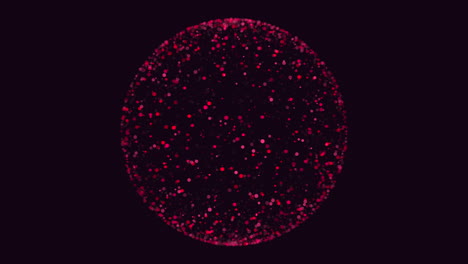 esfera de punto rojo que brilla contra un fondo oscuro