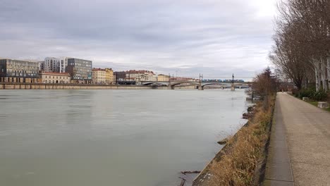 lyon's riverside promenade shrouded, offering a charming urban escape on a frosty day