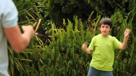 Little-boy-playing-ball-with-his-father-