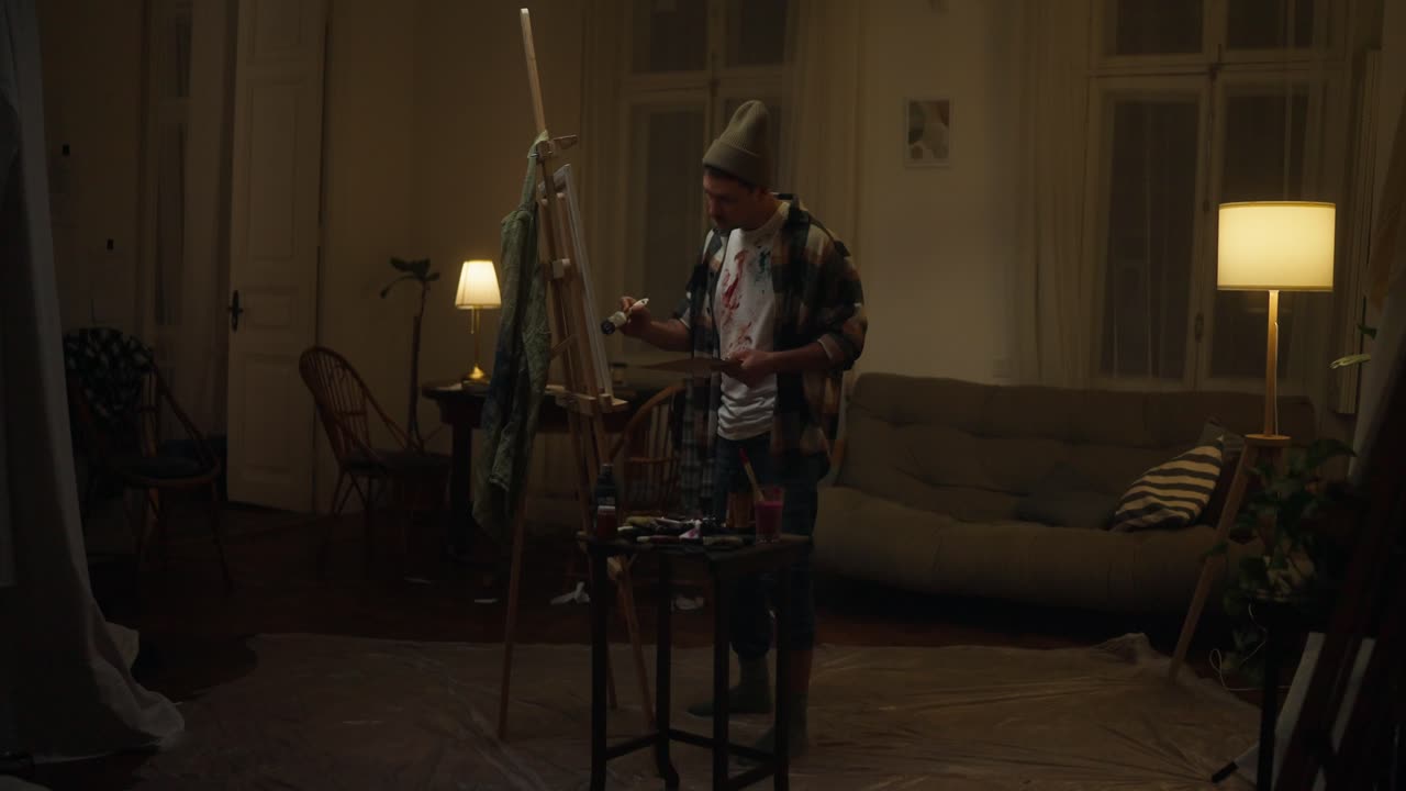 Artist Painting at Home at Night