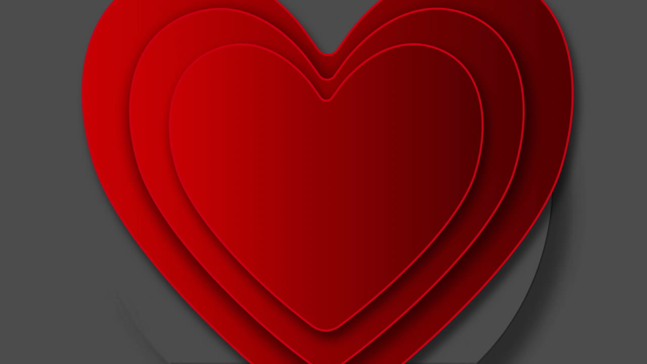 animación de corazones rojos pulsando sobre un fondo gris