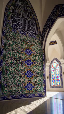 ornate mosaic tiles and stained glass in an islamic building