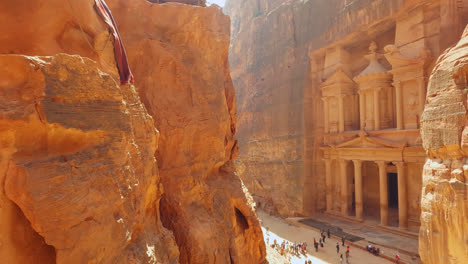 panning shot of the ruins of the treasury from a viewpoint in petra