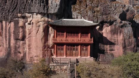 beautiful buddhist monastery built into mountainside, shibaoshan china, aerial