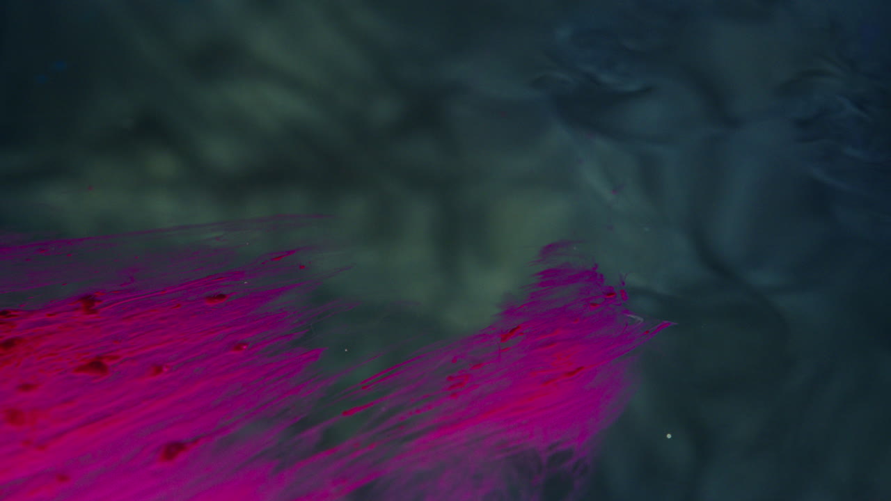 Colourful, organic, liquids macro shots buzzing and flowing