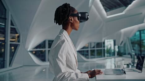 woman wearing vr headset in modern office