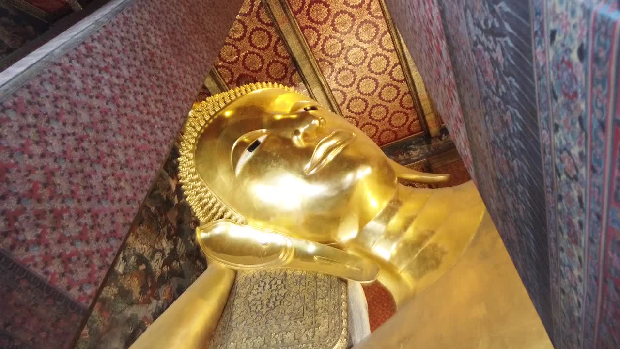 Giant Reclining Buddha at Wat Pho Bangkok Thailand, nobody