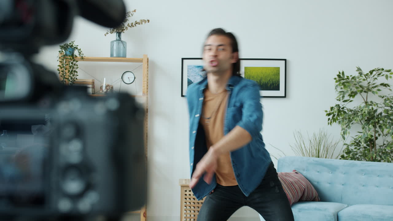 Man Dancing in Living Room for a Video