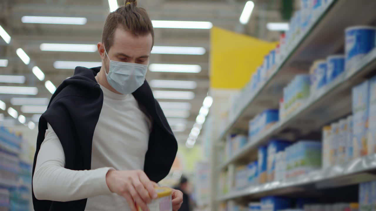 Man Wearing Mask Shopping in Supermarket