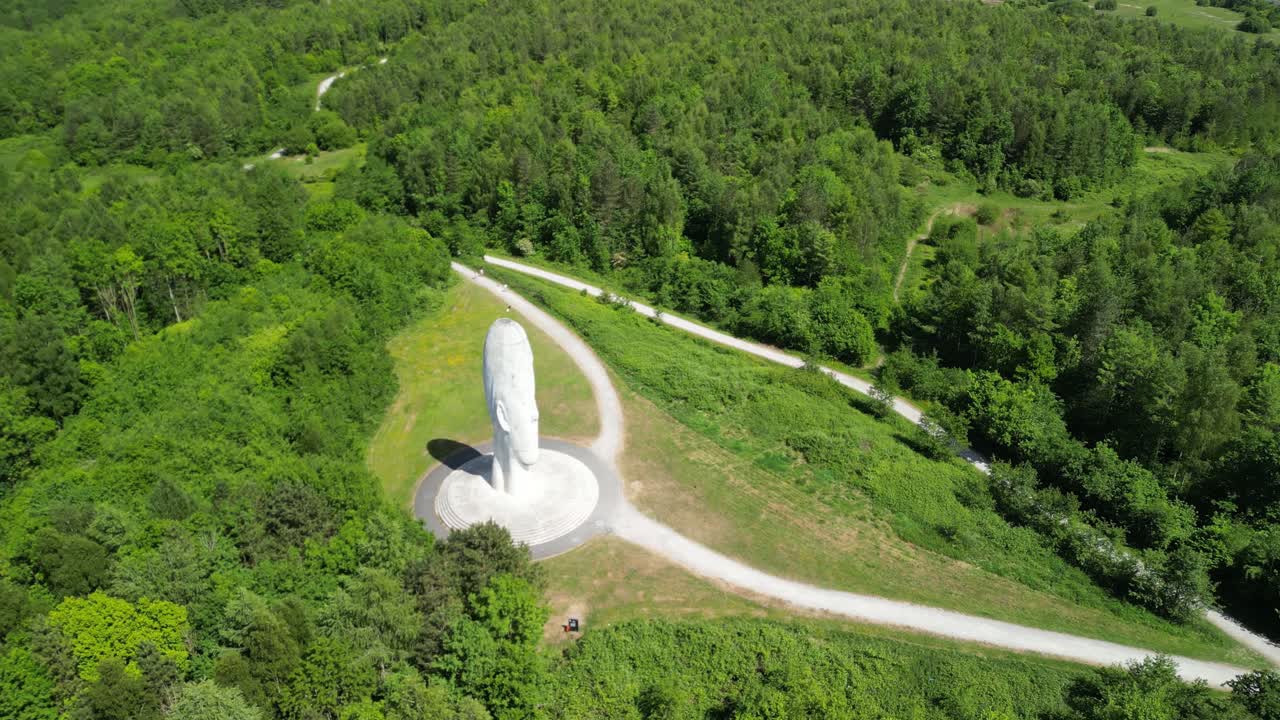 The mesmerizing Dream sculpture, St Helens - UK. Drone anticlockwise rotate and move in and over