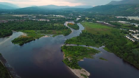 Fort-William-on-Loch-Linnhe-with-Ben-Nevis-behind,-Scottish-Highlands-aerial-view