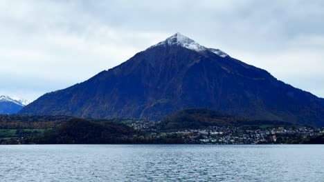 pyramid peak switzerland bus bahnhof travel swiss alps landscape thunersee lake cloudy stunning morning bern thun interlaken thunersee zurich saas fee seestrasse zermatt summer autumn fall jungfrau