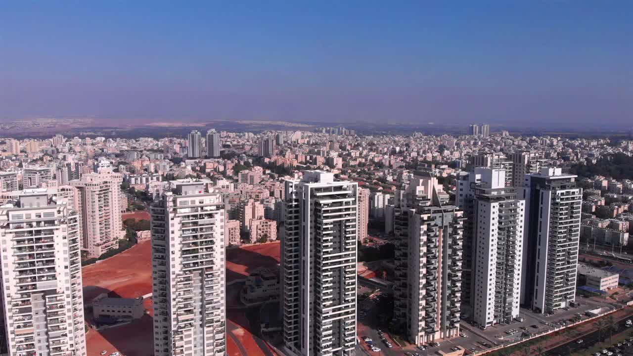 Aerial View of a Modern City Skyline with Residential Buildings