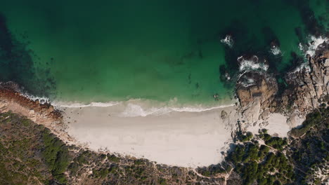 quiet sandy beach in llandudno, nudist beach, cape town - aerial shot