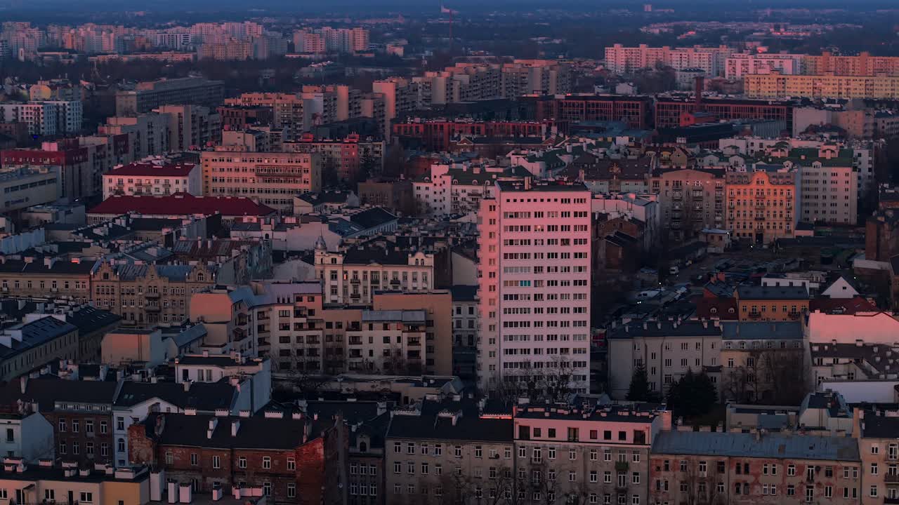 Warsaw at sunset showing the praga district with residential buildings from the 70s and 80s, aerial view