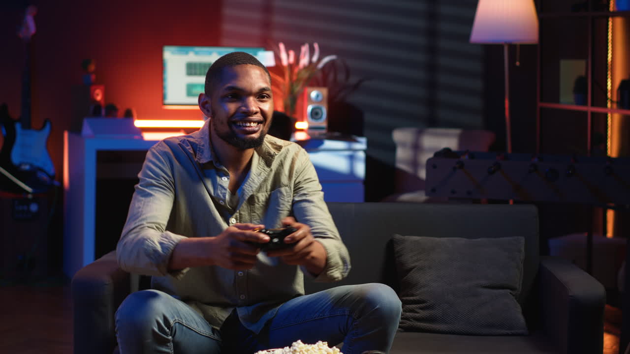 Vertical Video Cheerful confident person winning the video games championship