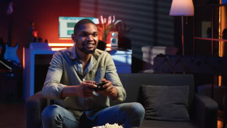 vertical video cheerful confident person winning the video games championship