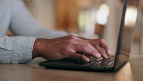 hands, man and typing on laptop at night in office