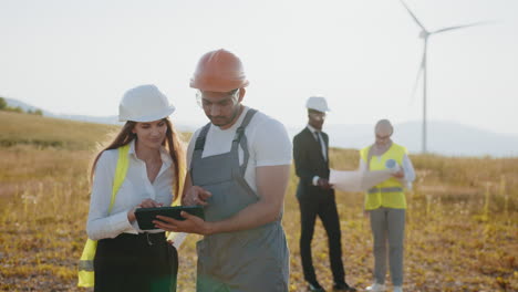 wind farm engineering team discussing project